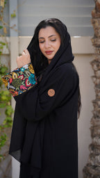 Leaf-patterned abaya